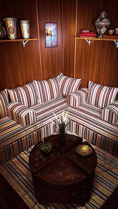 Traditional Qatari majlis corner with guitar detail